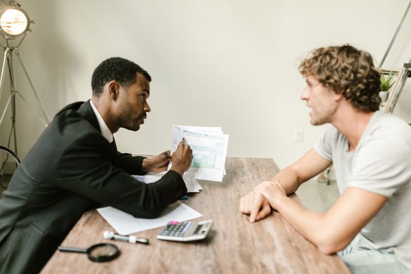 A setup advisor guiding a client through the paperwork